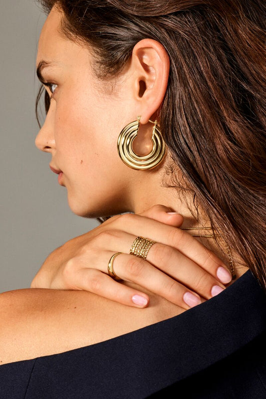 Bold hoop earrings with disc