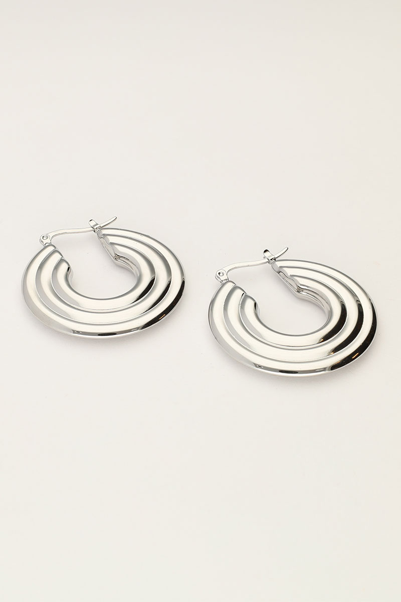 Bold hoop earrings with disc